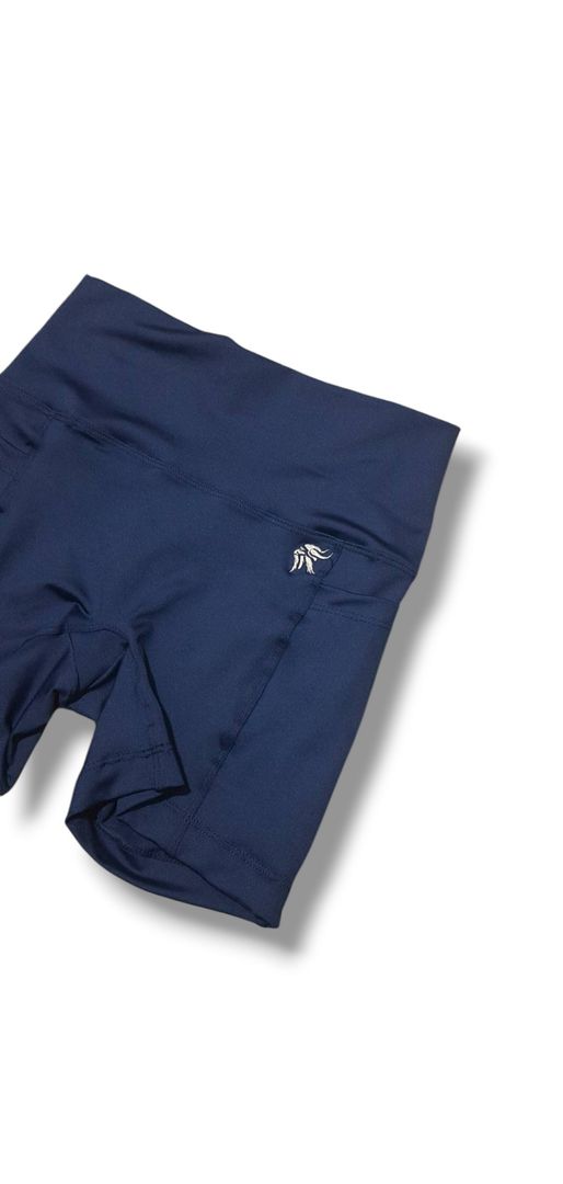 Short Hybrid ajustado con bolsillos laterales y sin costura delantera tiro alto Lycra