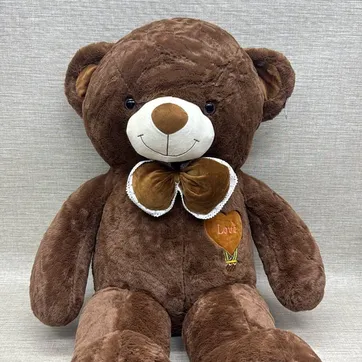 Imagen del producto OSO PATAS LARGAS CAFE OSCURO CON MOÑO 90 CM