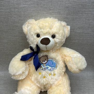 Imagen del producto OSO CON BORDADO Y MOÑO 45 CM