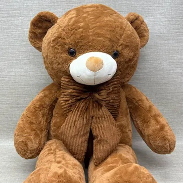 Imagen del producto OSO PATAS LARGAS CAFE CON MOÑO 1, 20 CM