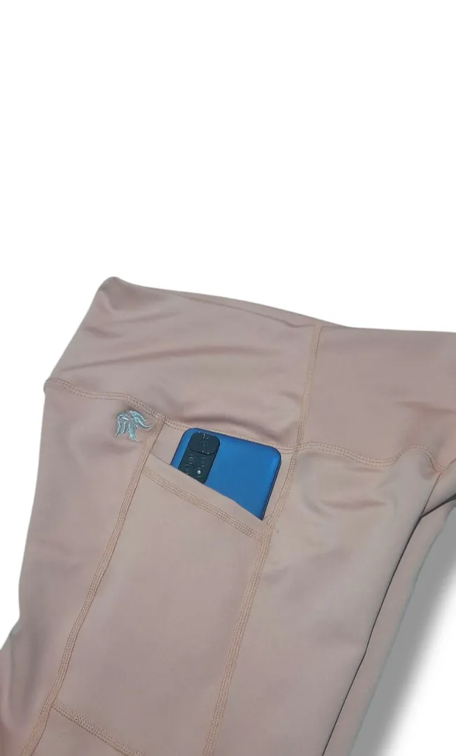 Leggings Running con bolsillos laterales y sin costura delantera tiro alto Lycra