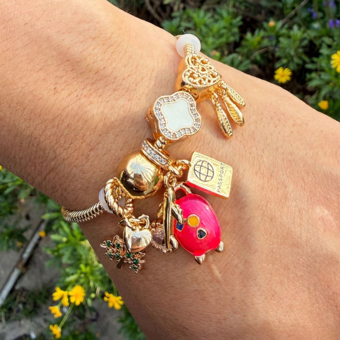 Pulsera travel charms Rosa