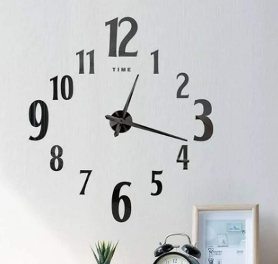 Reloj de pared triangulo 
