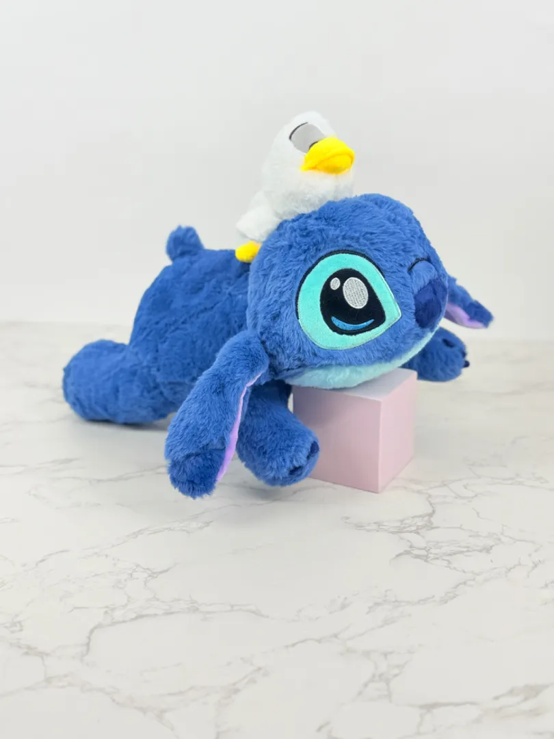 STITCH CON PATO ACOSTADO 