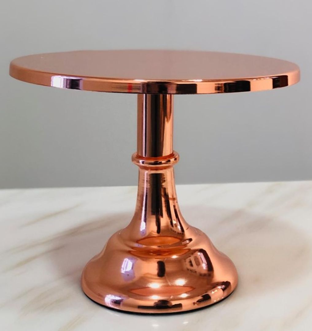 Base para pasteles en metal rosa gold.