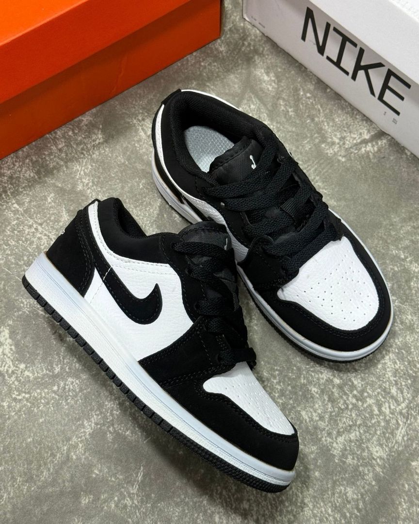 RETRO 1 LOW BLANCO NEGRO 1.1