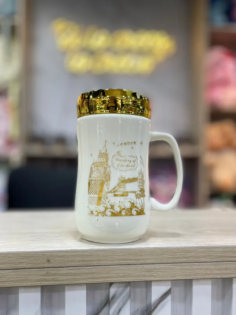 MUG TAPA ESPEJO DORADO 