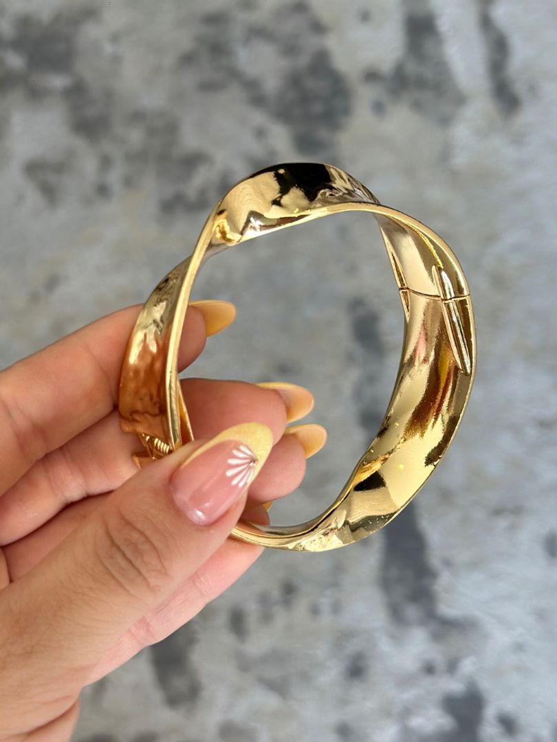 Pulsera cuevas dorada 