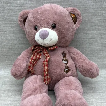 Imagen del producto OSO ROSA PALO CON MOÑO DE CUADROS 55 CM