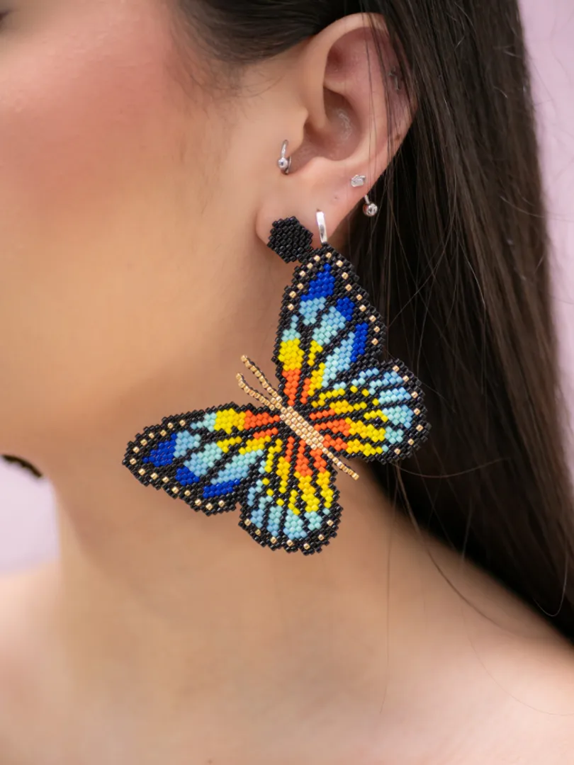 Arete Mariposa Miyuki con Topo
