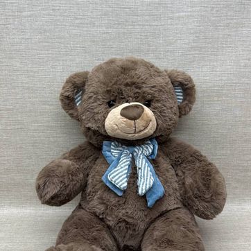 Imagen del producto OSO CAFÉ CON MOÑO AZUL 60 CM