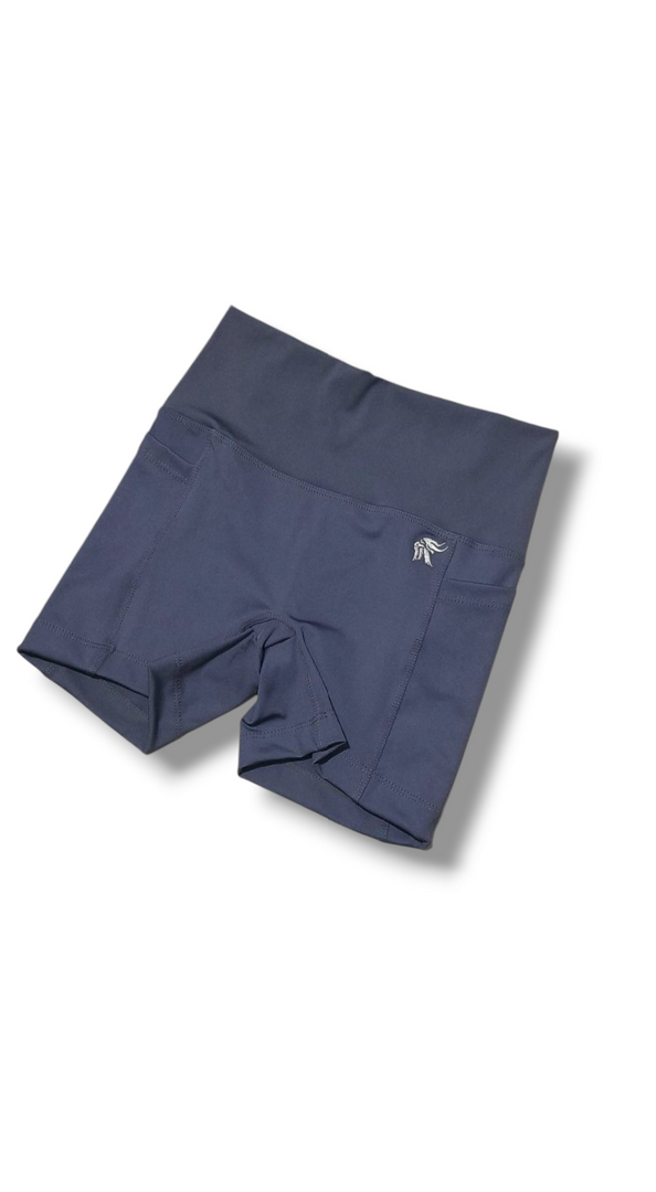 Short Hybrid ajustado con bolsillos laterales y sin costura delantera tiro alto Lycra