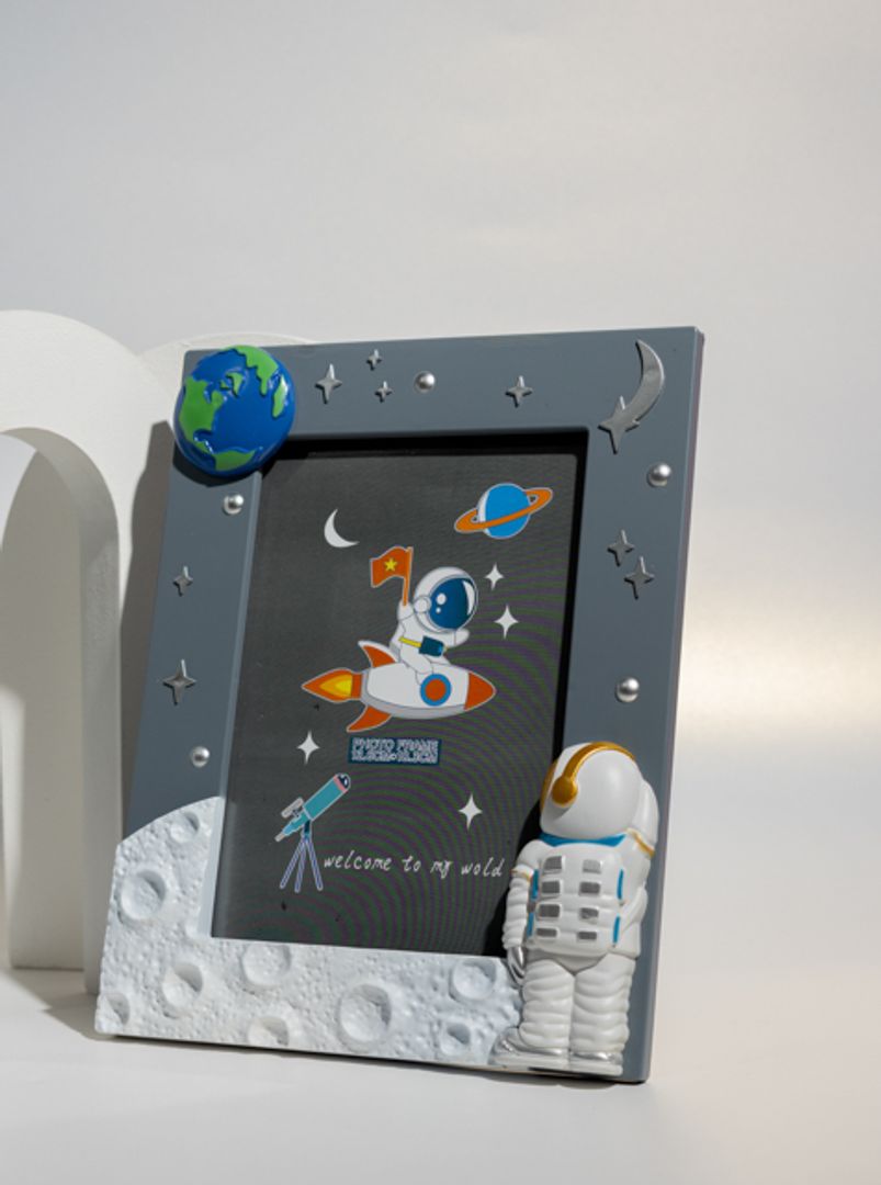 PORTARETRATO ASTRONAUTA PARADO