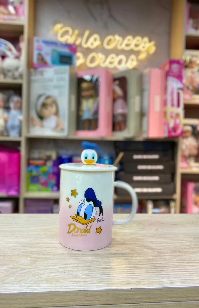 TAZA DONALD CON TAPA FIGURA