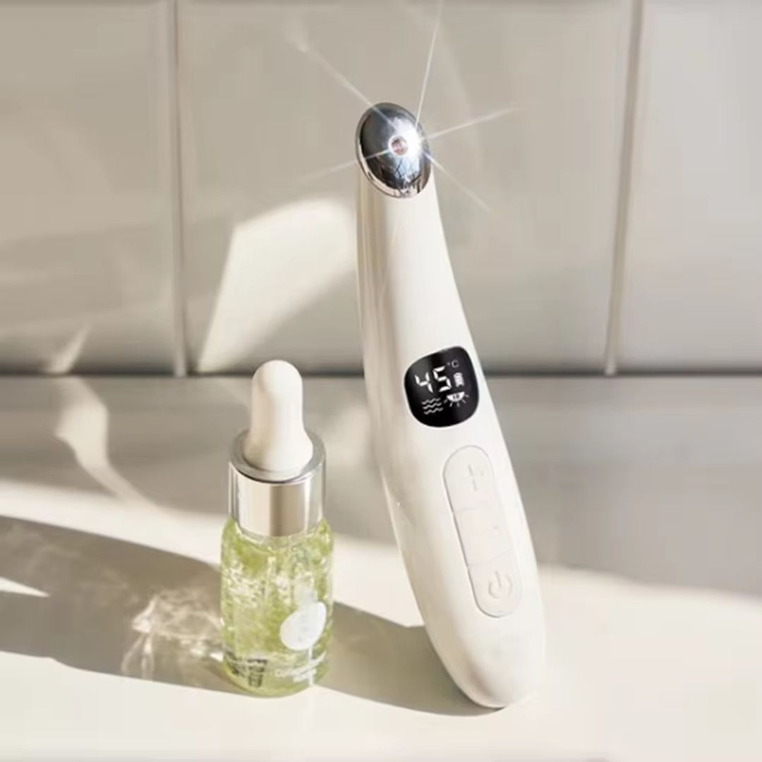 Masajeador facial térmico con vibración 
